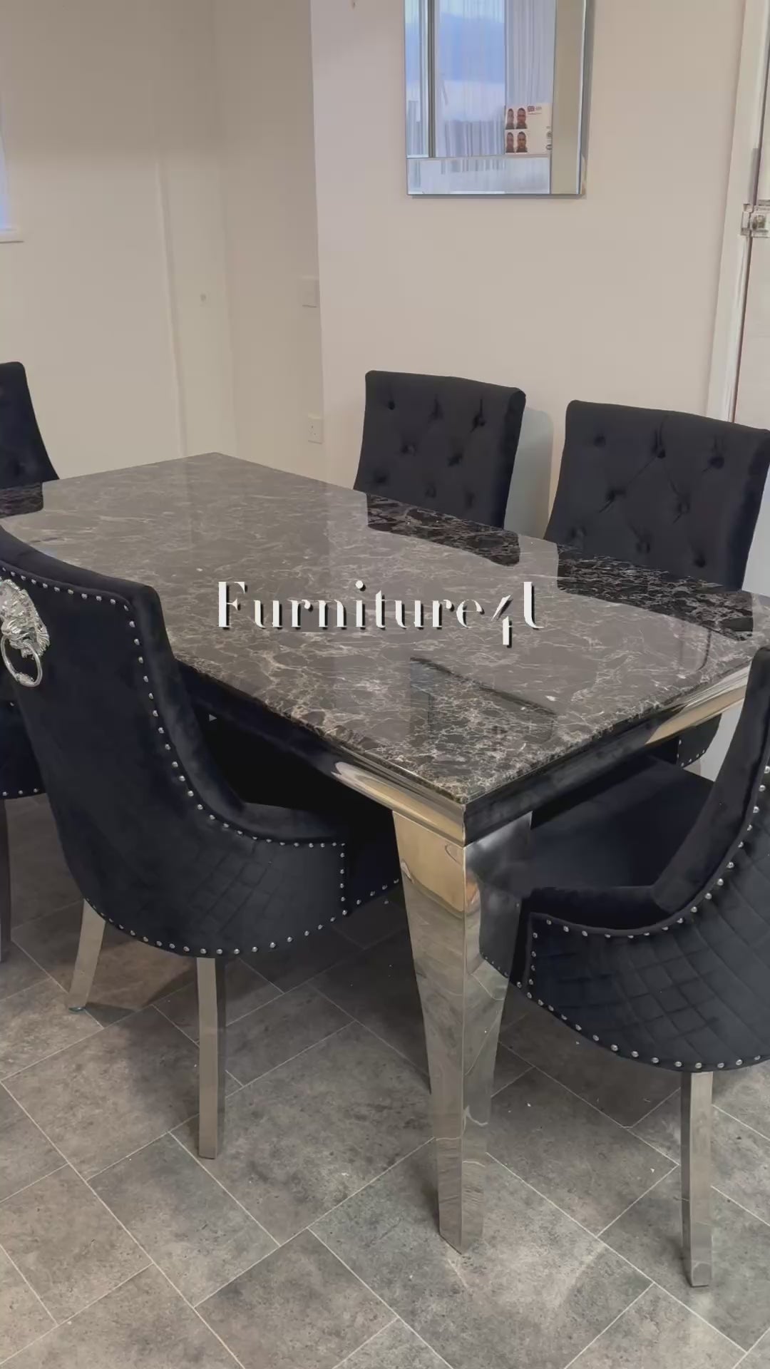 1.5 Black Louis Table 6 Black Lion Knocker Chairs